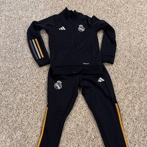 Adidas Real Madrid tracksuit. Bought at Santiago Bernbeu in Madrid.  Size 7/8